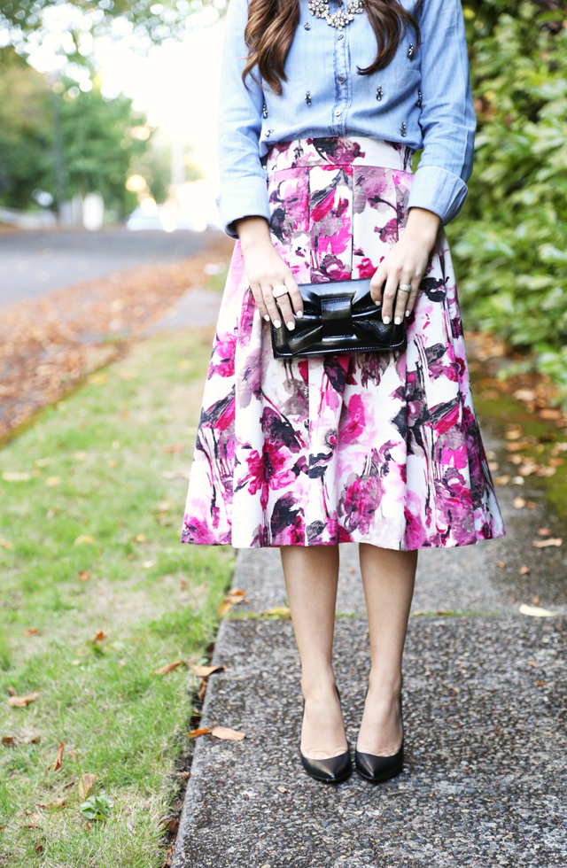 pink floral skirt black bow clutch