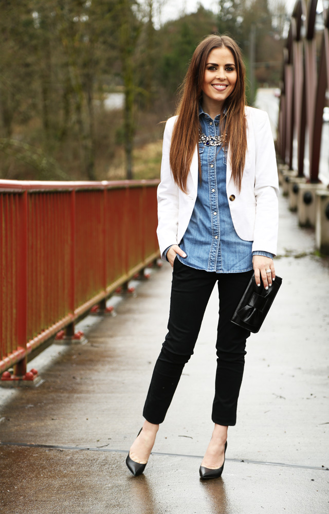 denim top, white blazer, black pants, heels and a clutch