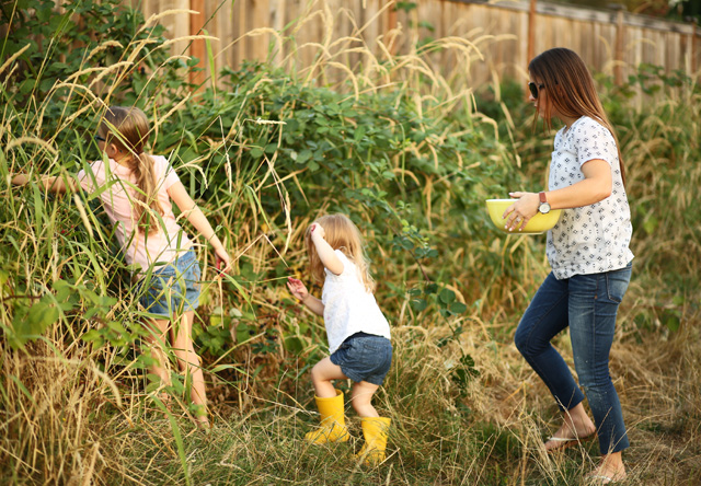 mother daughters blackberry picking