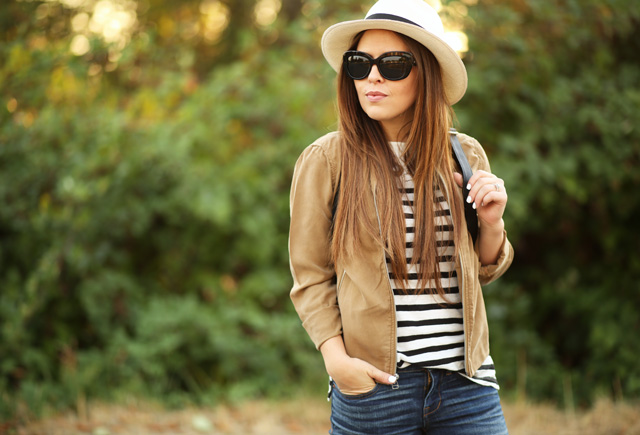 panama hat black and white striped top tan jacket