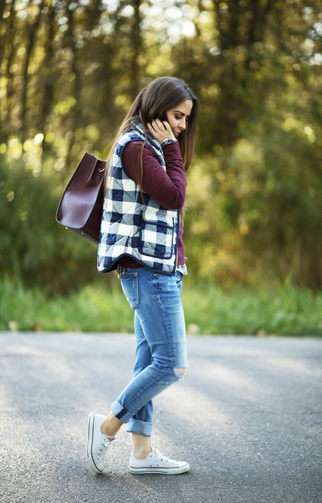 layered casual look for fall buffalo vest