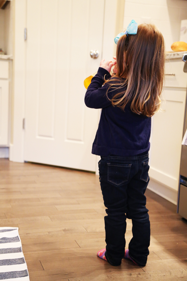 toddler drinking a soda