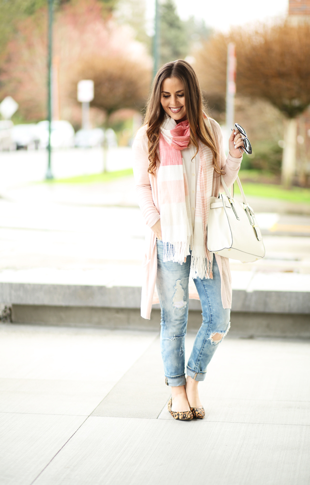 distressed skinny jeans white blouse pink sweater