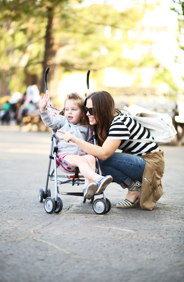 mom and toddler in disneyland