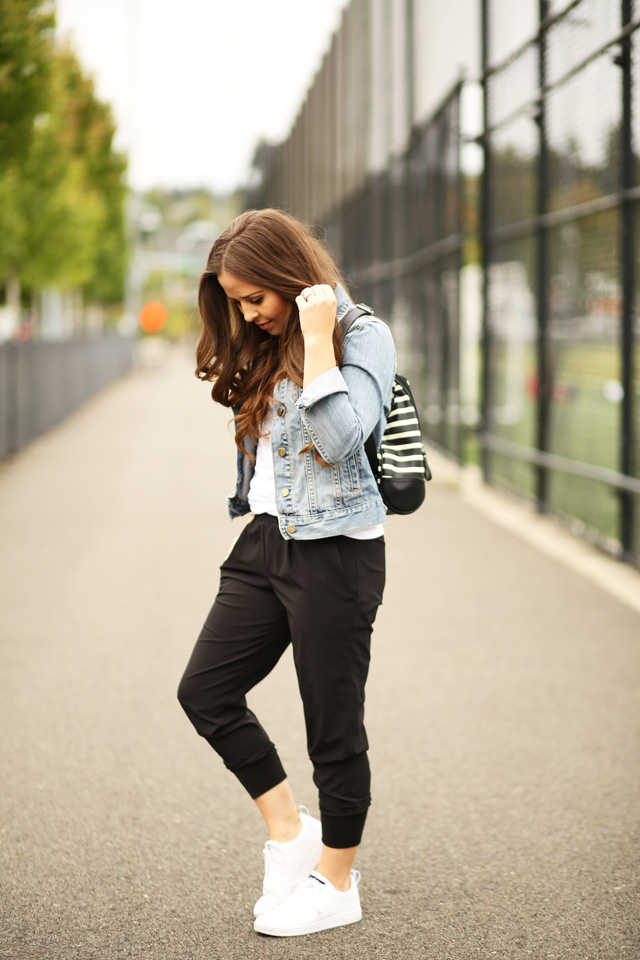 black joggers and white adidas